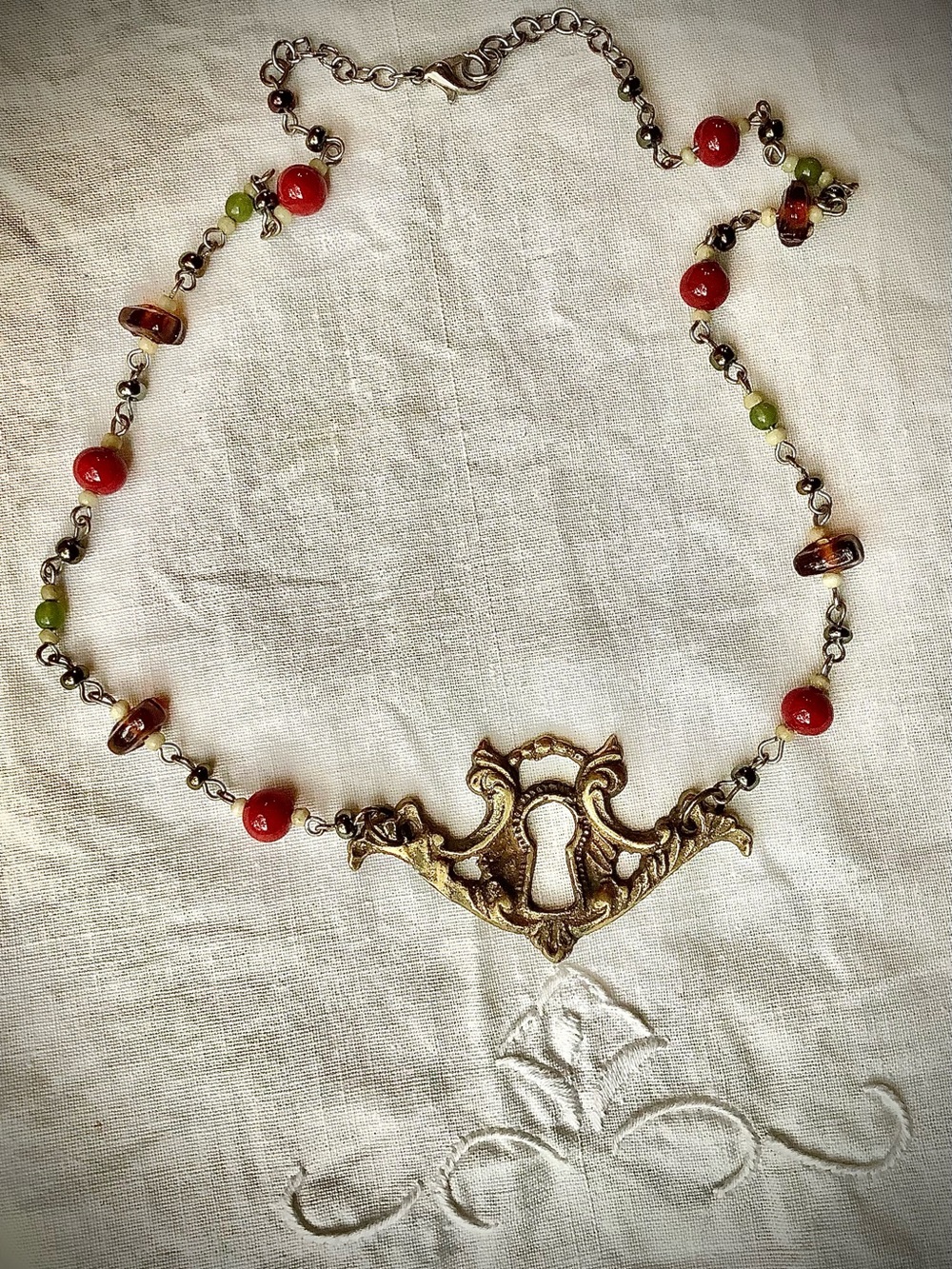 Antique brass Escutcheon necklace